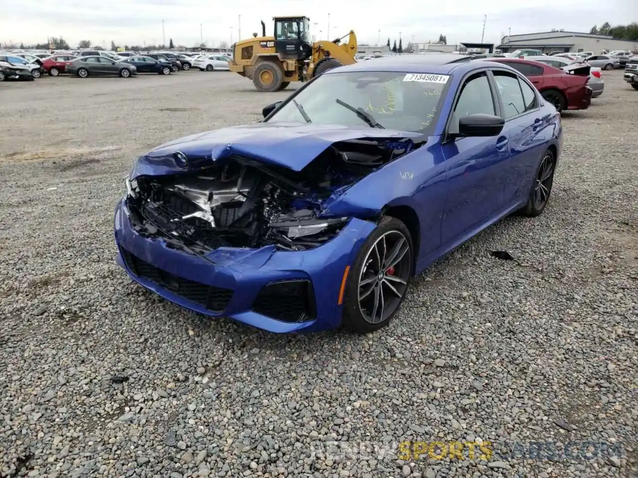 2 Photograph of a damaged car 3MW5U7J06N8C29875 BMW M3 2022