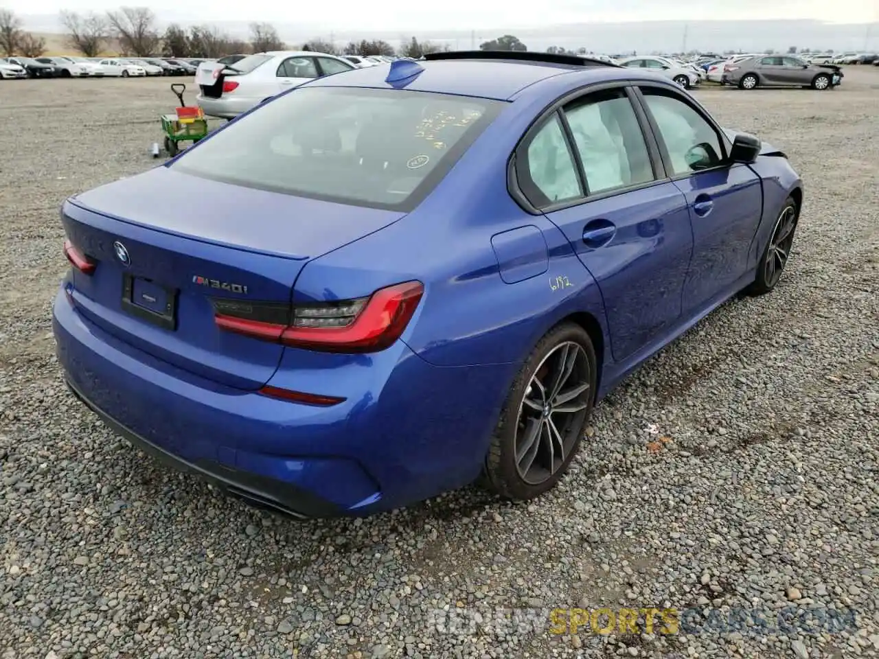 4 Photograph of a damaged car 3MW5U7J06N8C29875 BMW M3 2022