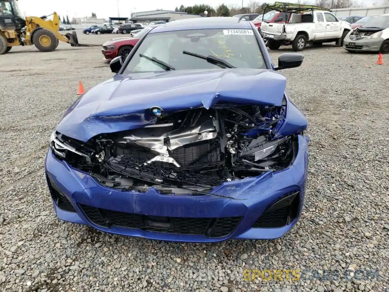 9 Photograph of a damaged car 3MW5U7J06N8C29875 BMW M3 2022