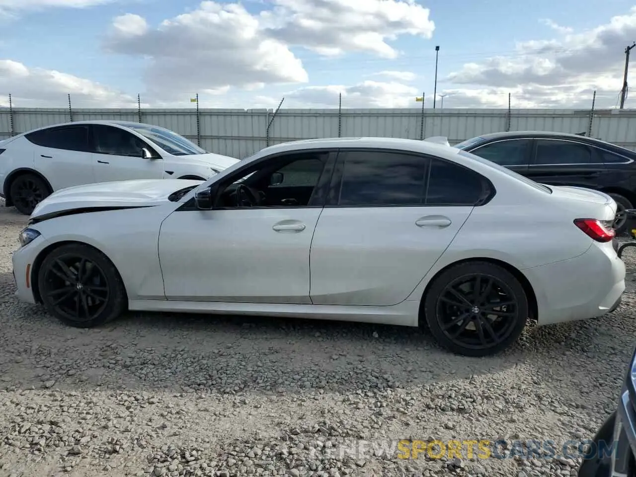 2 Photograph of a damaged car 3MW5U7J06N8C31187 BMW M3 2022