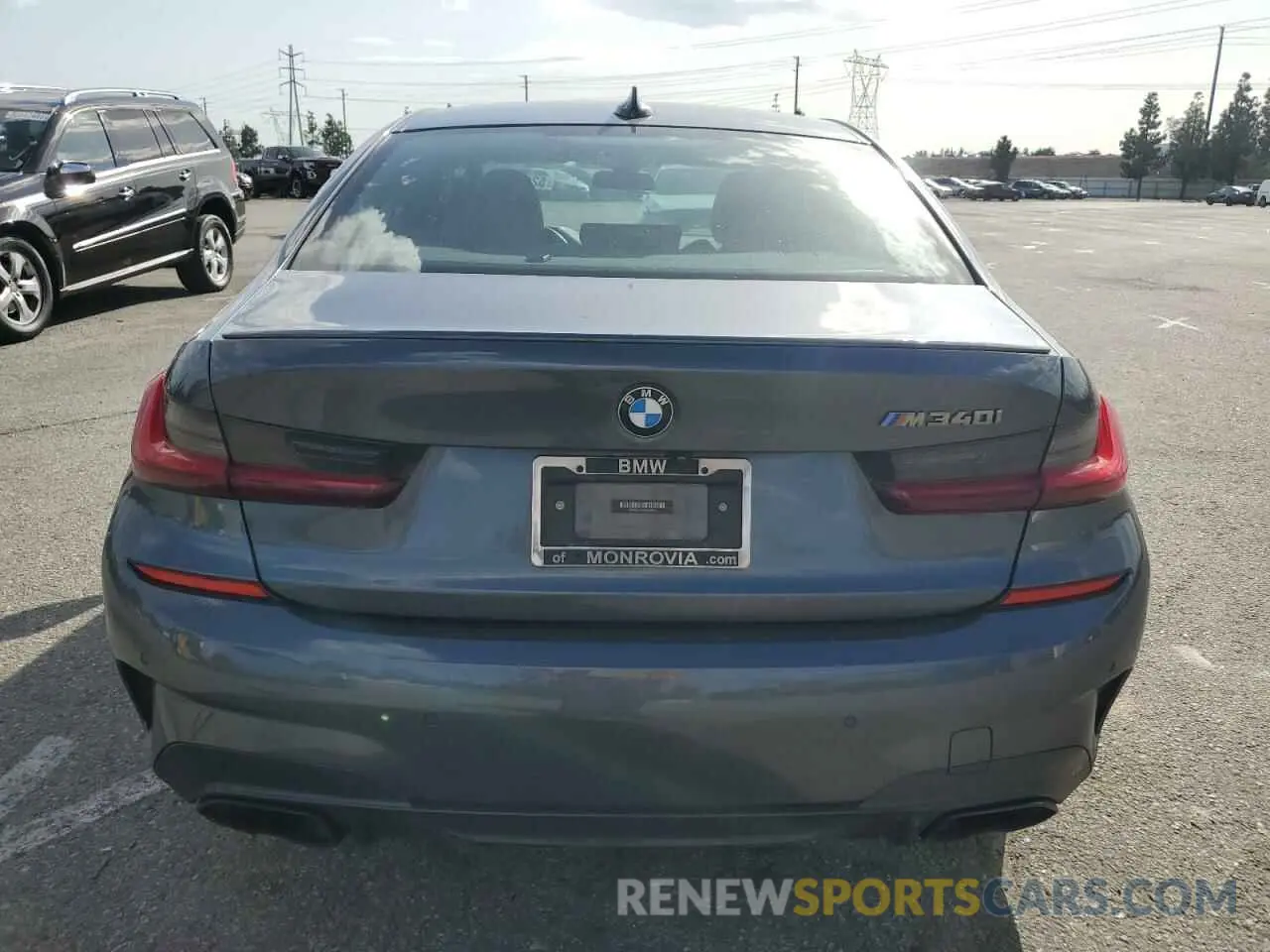 6 Photograph of a damaged car 3MW5U7J09N8C28073 BMW M3 2022