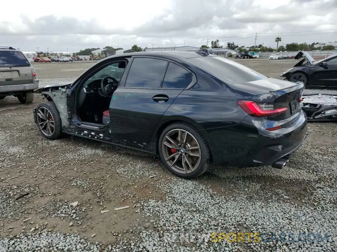 2 Photograph of a damaged car 3MW5U7J09N8C43110 BMW M3 2022