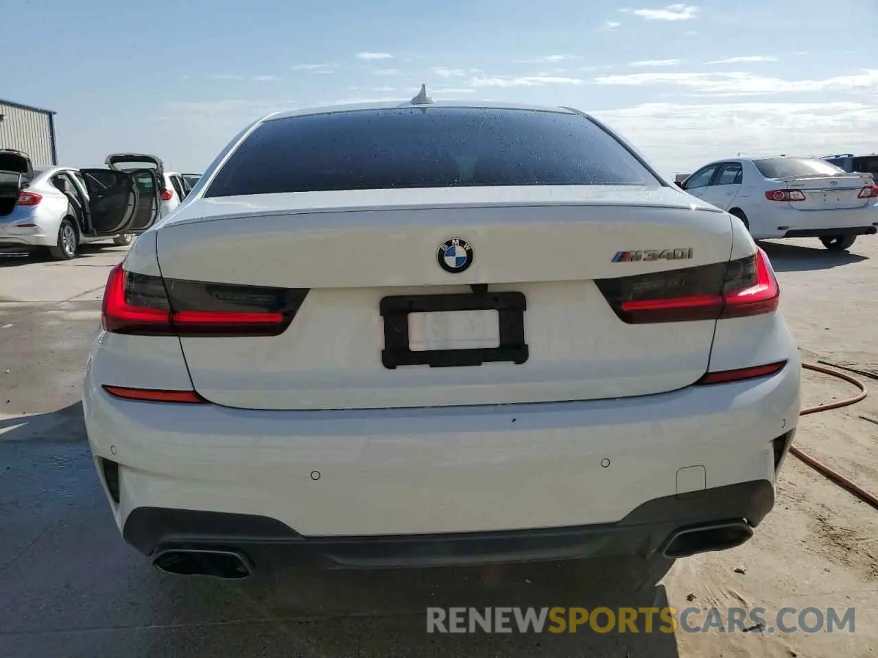 6 Photograph of a damaged car 3MW5U7J0XN8C26736 BMW M3 2022