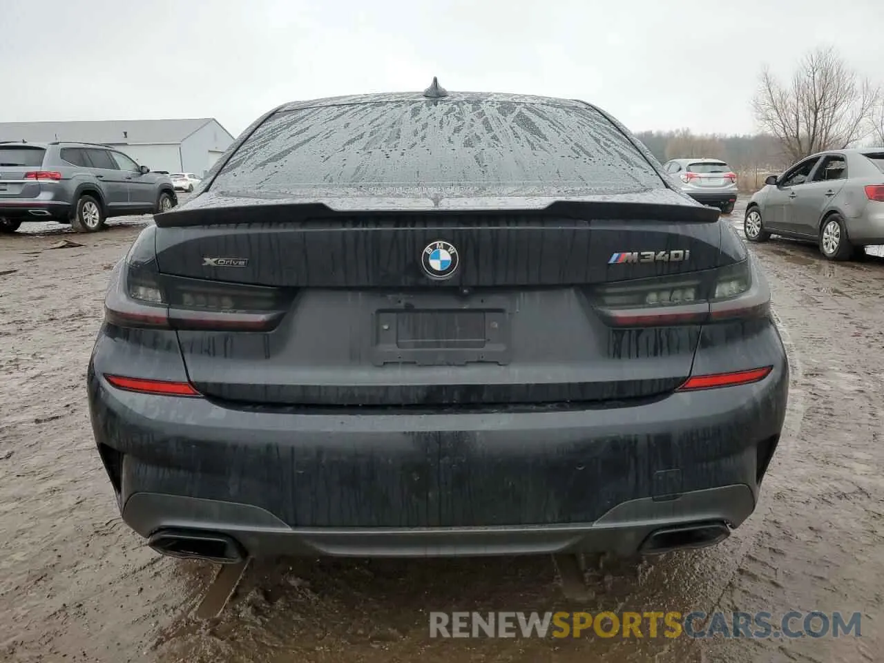 6 Photograph of a damaged car 3MW5U9J01N8C39211 BMW M3 2022