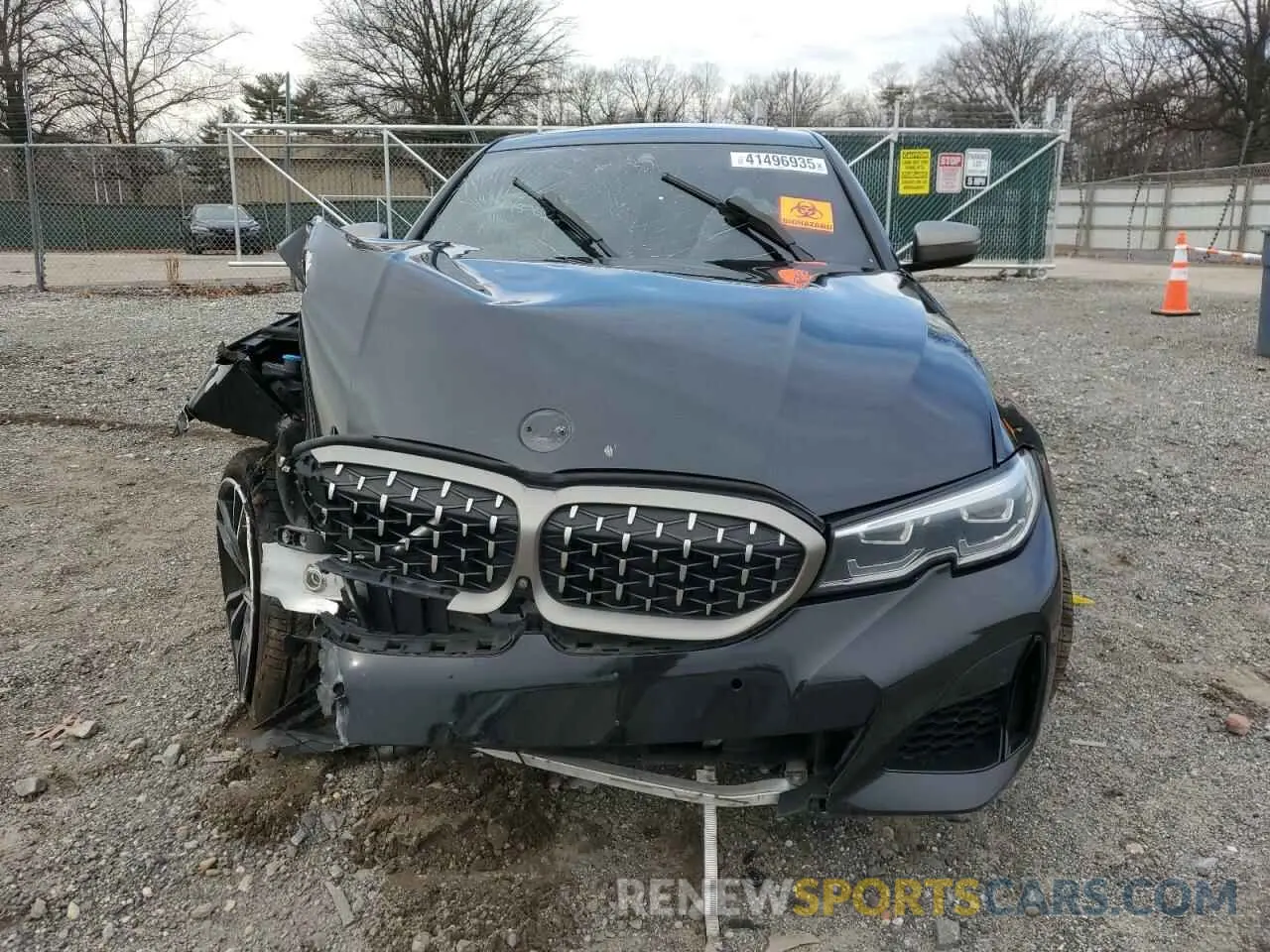 5 Photograph of a damaged car 3MW5U9J03N8C25391 BMW M3 2022