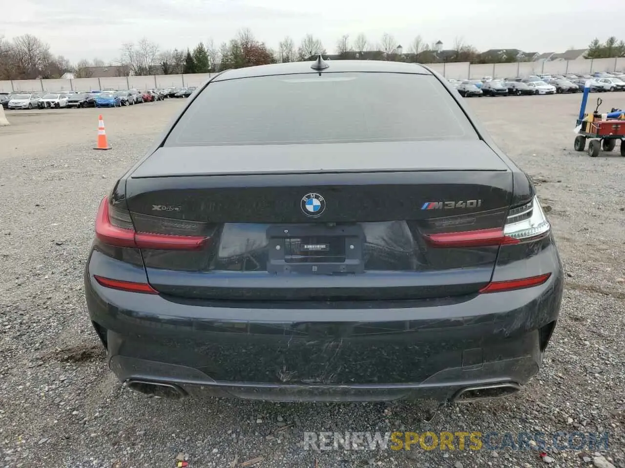 6 Photograph of a damaged car 3MW5U9J03N8C25391 BMW M3 2022