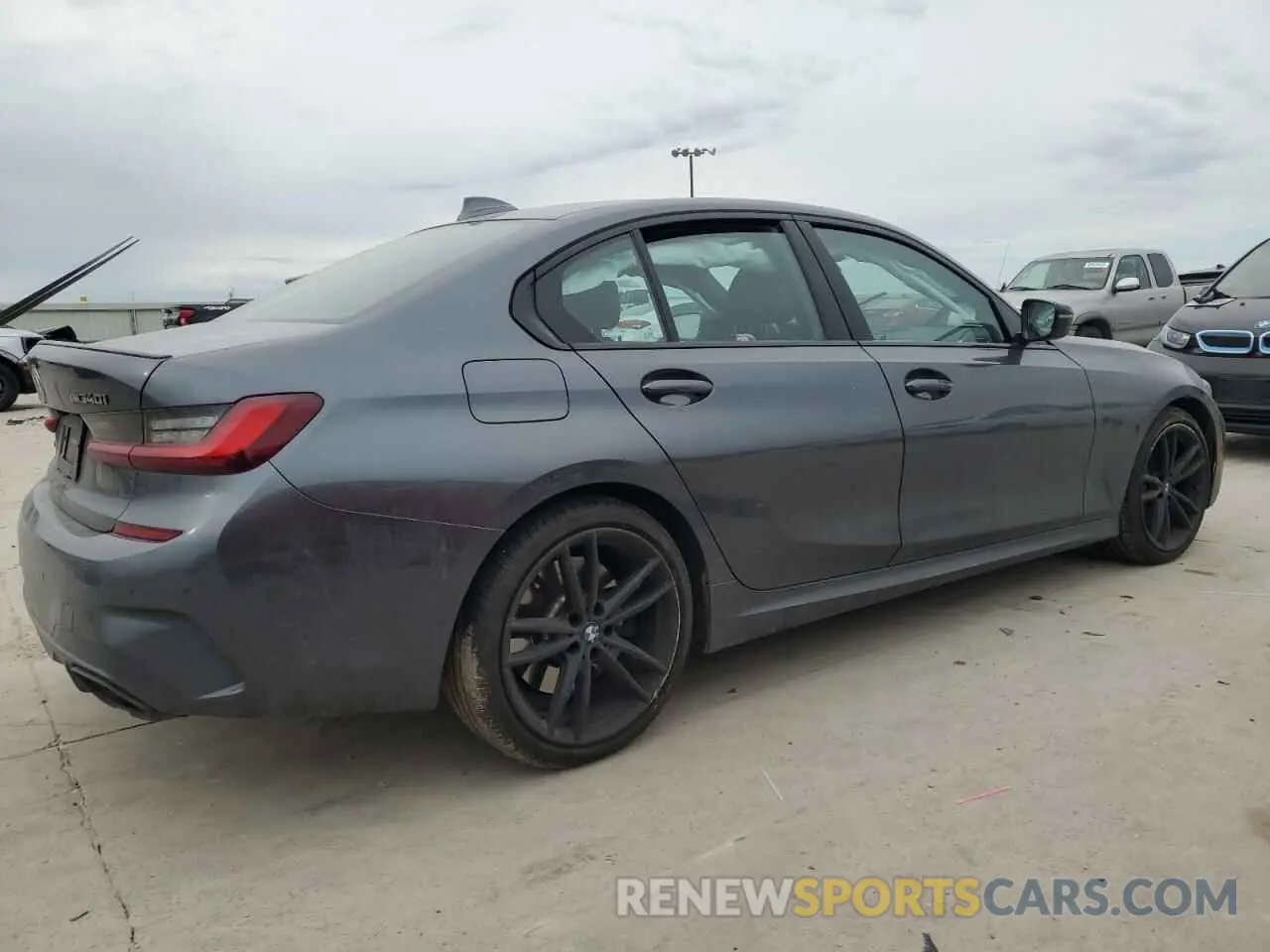 3 Photograph of a damaged car 3MW5U9J07N8C42470 BMW M3 2022