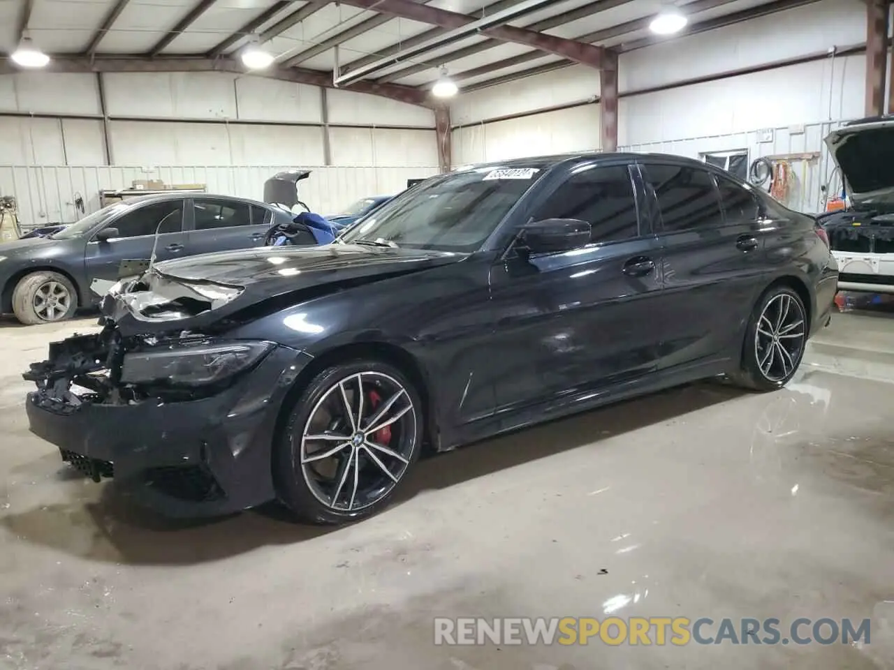 1 Photograph of a damaged car 3MW5U9J08N8C24995 BMW M3 2022