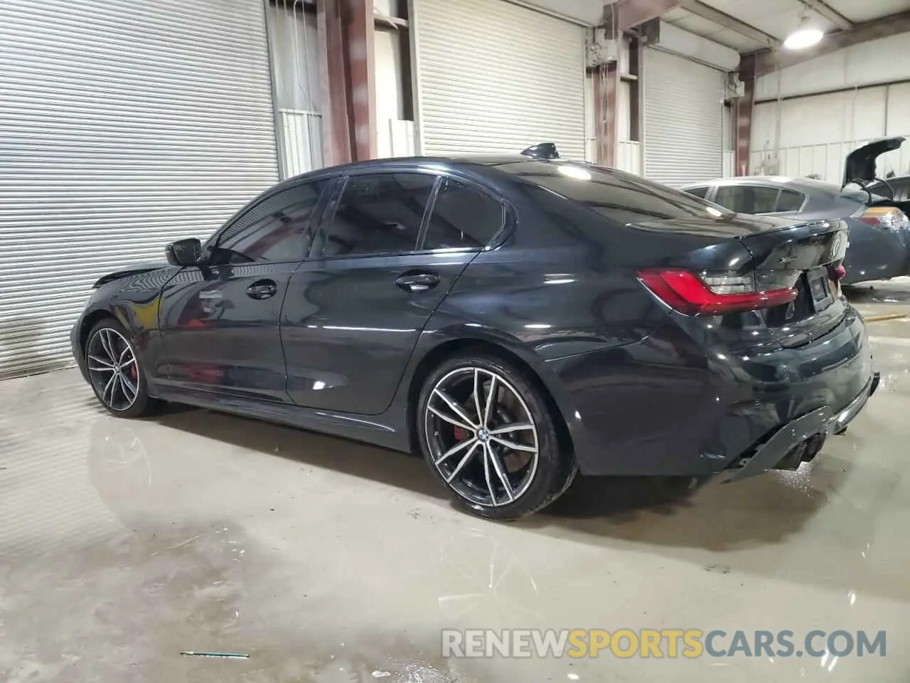 2 Photograph of a damaged car 3MW5U9J08N8C24995 BMW M3 2022