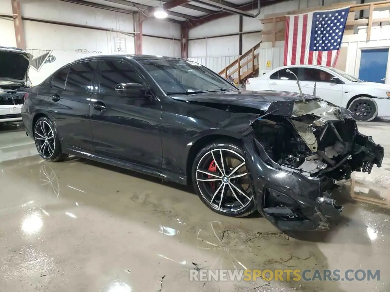 4 Photograph of a damaged car 3MW5U9J08N8C24995 BMW M3 2022