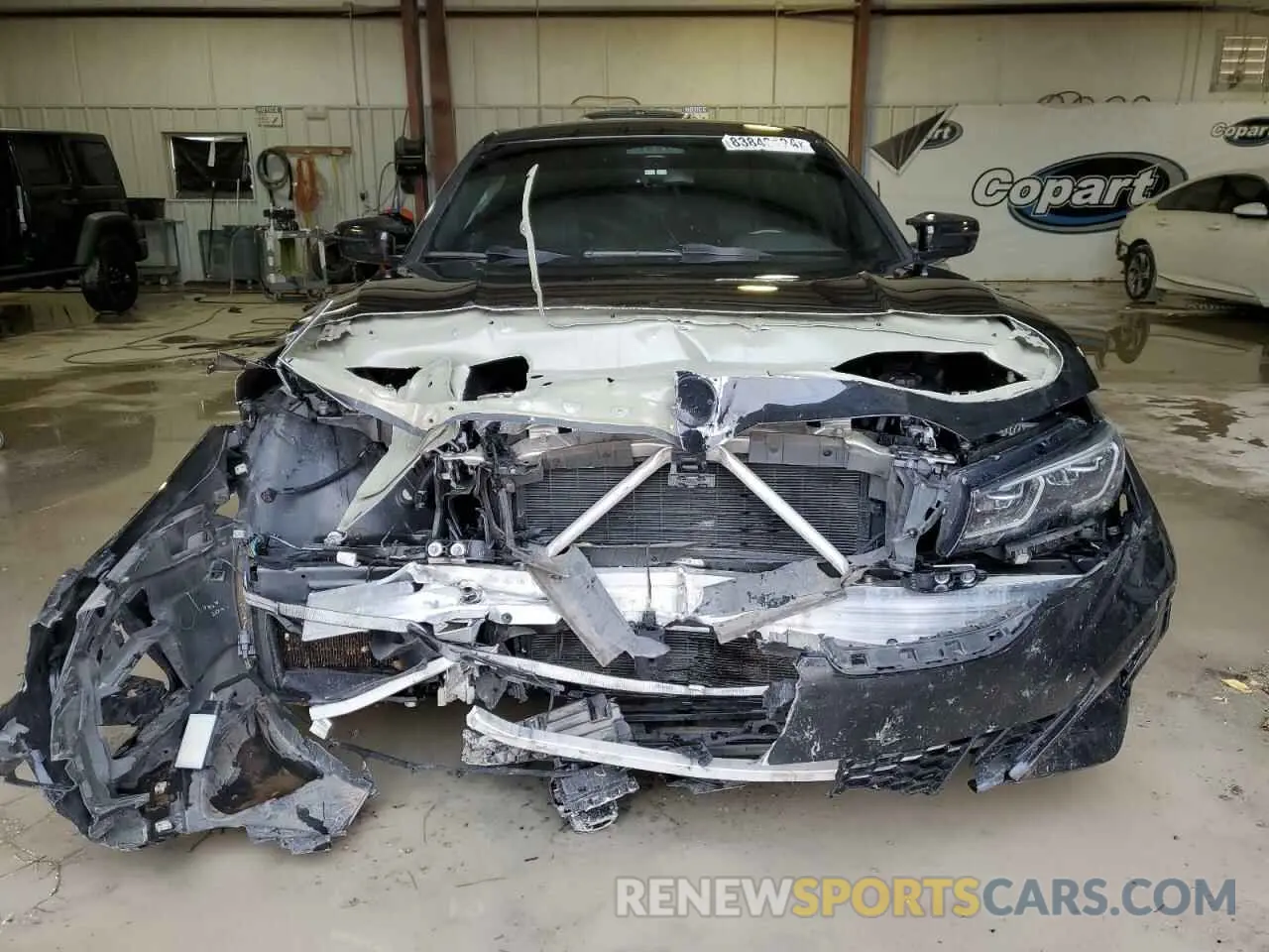 5 Photograph of a damaged car 3MW5U9J08N8C24995 BMW M3 2022