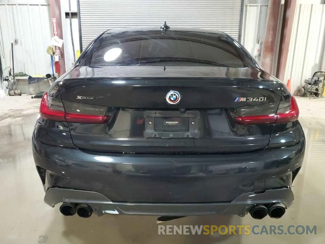 6 Photograph of a damaged car 3MW5U9J08N8C24995 BMW M3 2022