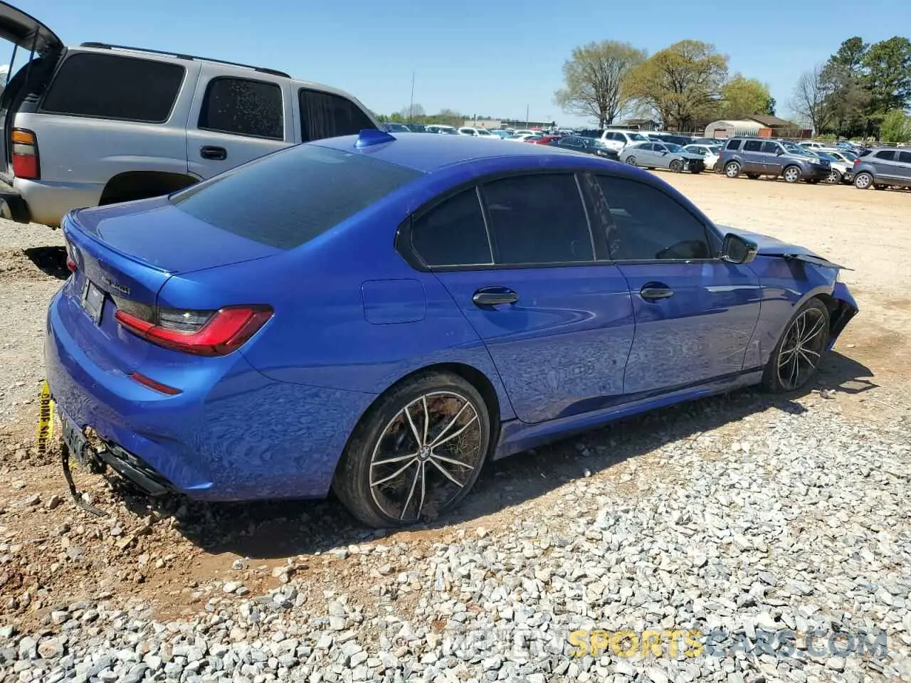 3 Photograph of a damaged car 3MW5U9J08N8C40243 BMW M3 2022