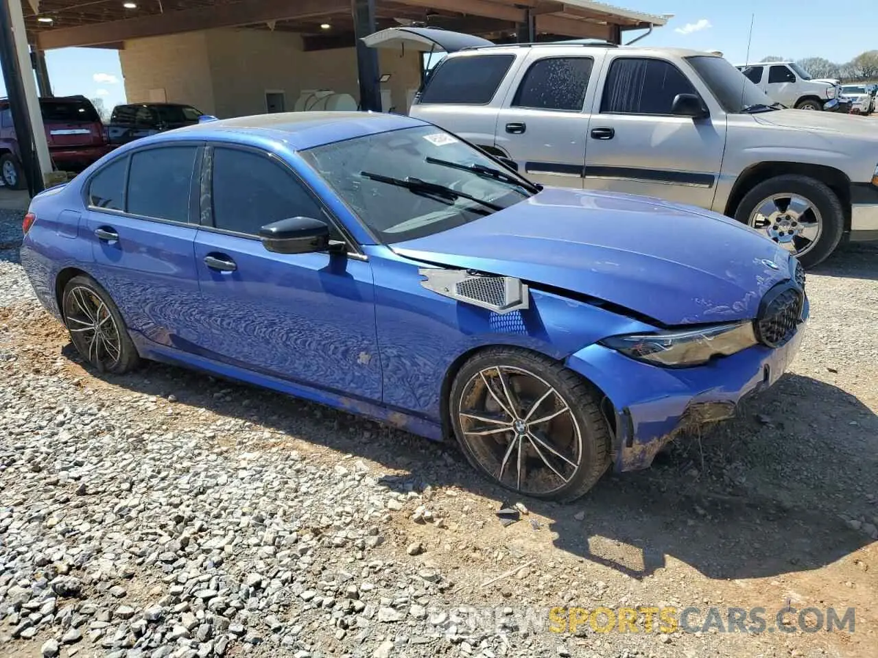 4 Photograph of a damaged car 3MW5U9J08N8C40243 BMW M3 2022
