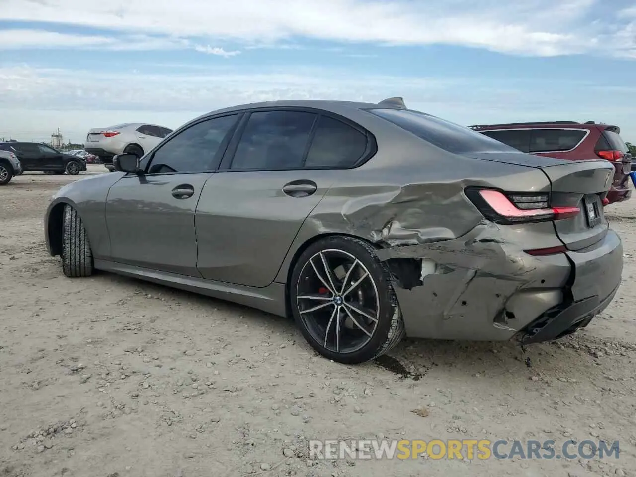 2 Photograph of a damaged car WBA5U7C01NFM17143 BMW M3 2022
