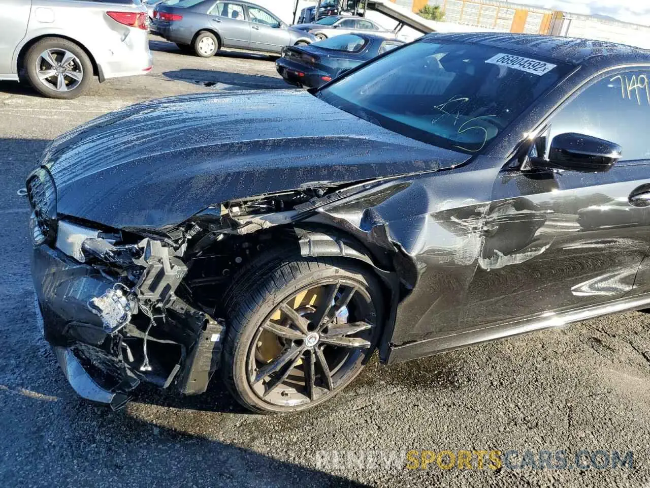 9 Photograph of a damaged car WBA5U7C0XNFM73498 BMW M3 2022