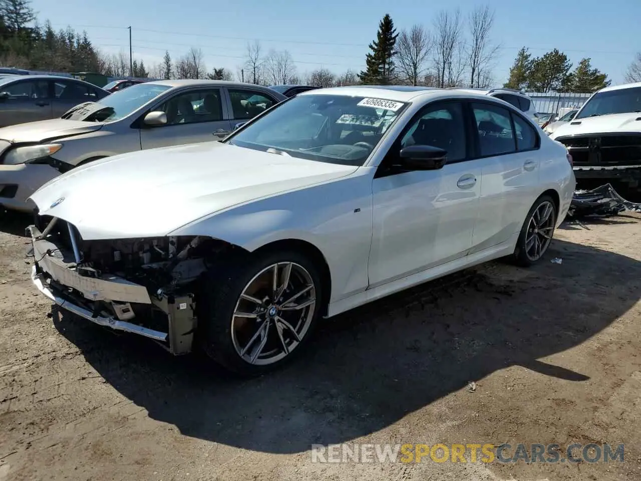 1 Photograph of a damaged car WBA5U9C02NFM31354 BMW M3 2022