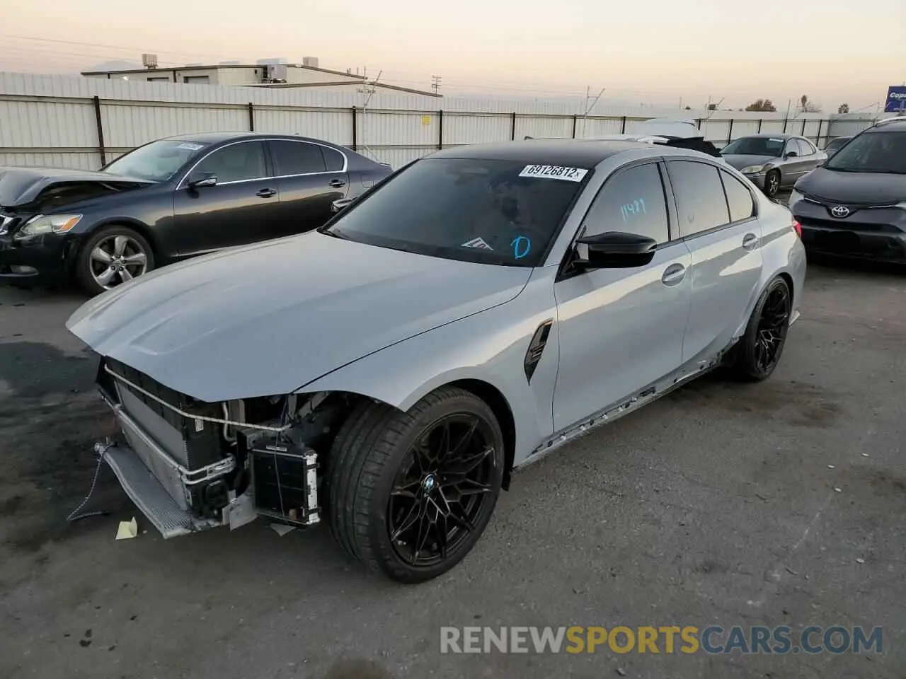 1 Photograph of a damaged car WBS33AY02NFL74430 BMW M3 2022