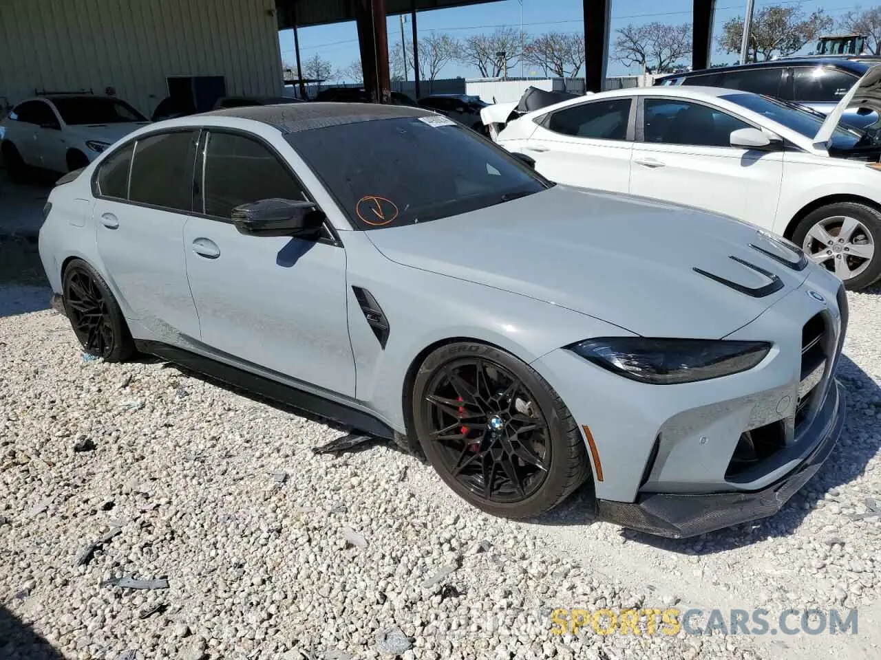 4 Photograph of a damaged car WBS33AY08NFM05034 BMW M3 2022