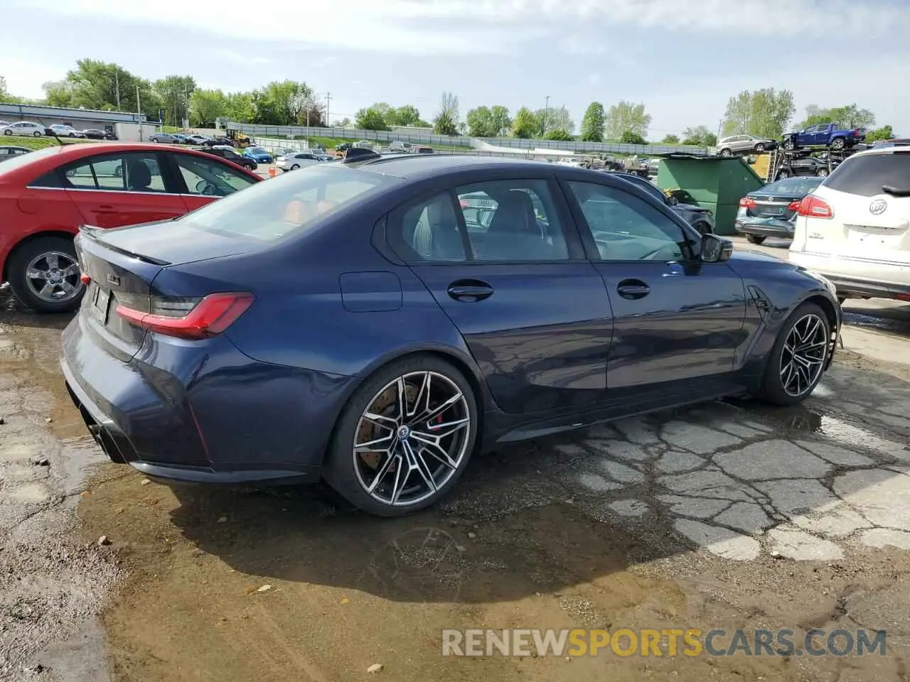 3 Photograph of a damaged car WBS43AY06NFN13995 BMW M3 2022
