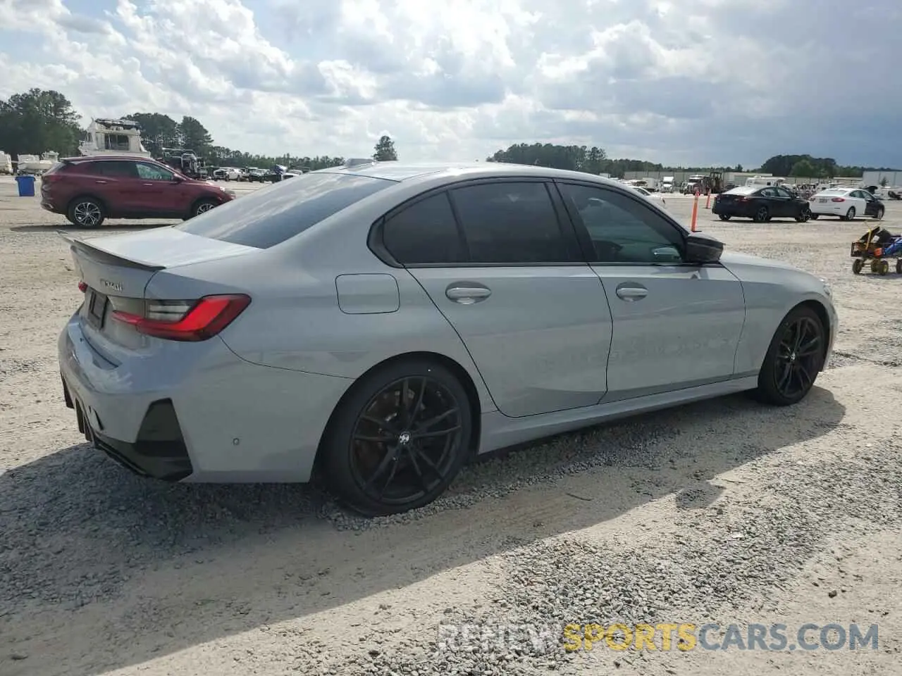 3 Photograph of a damaged car 3MW49FF01P8C96323 BMW M3 2023