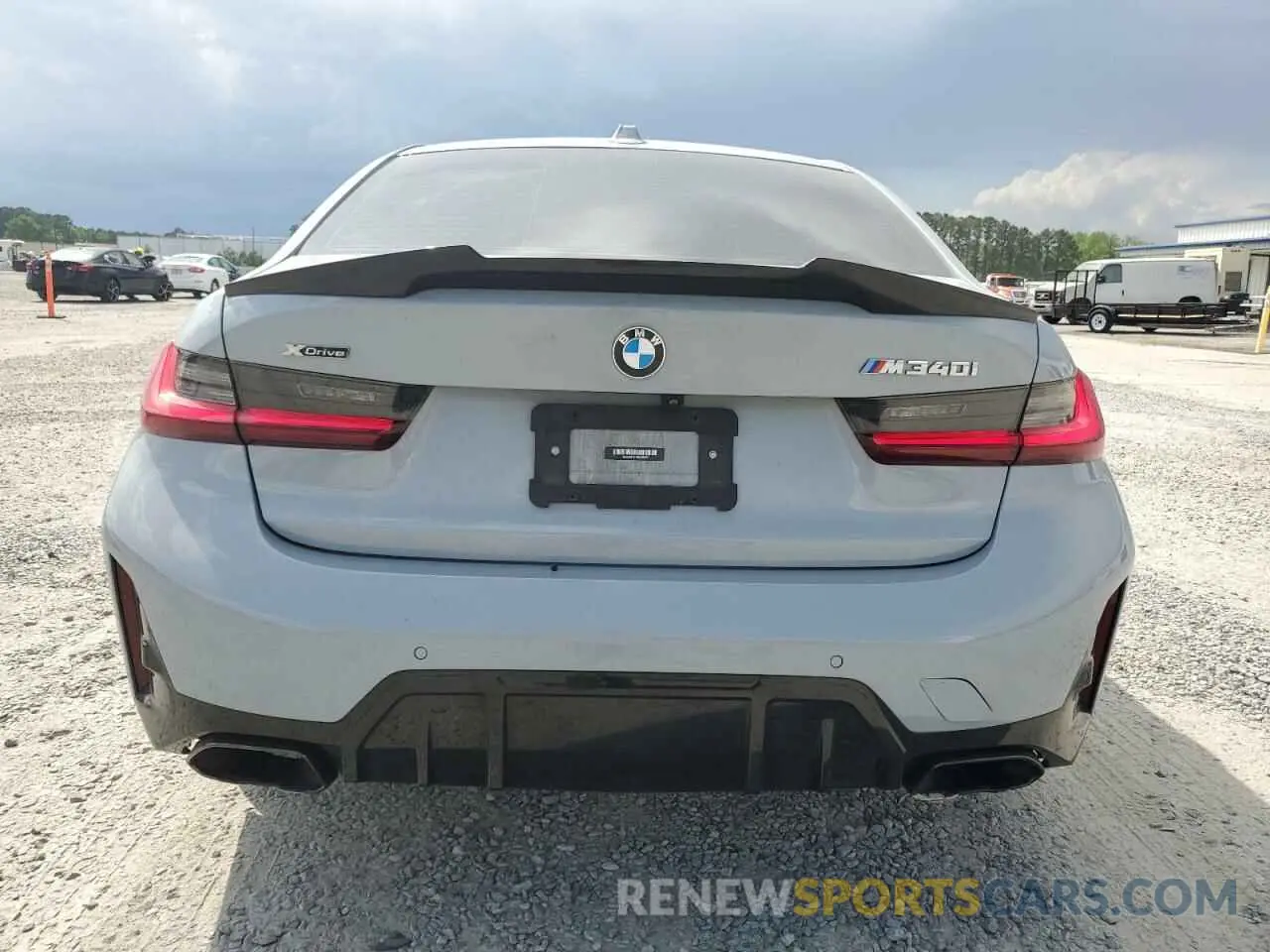 6 Photograph of a damaged car 3MW49FF01P8C96323 BMW M3 2023