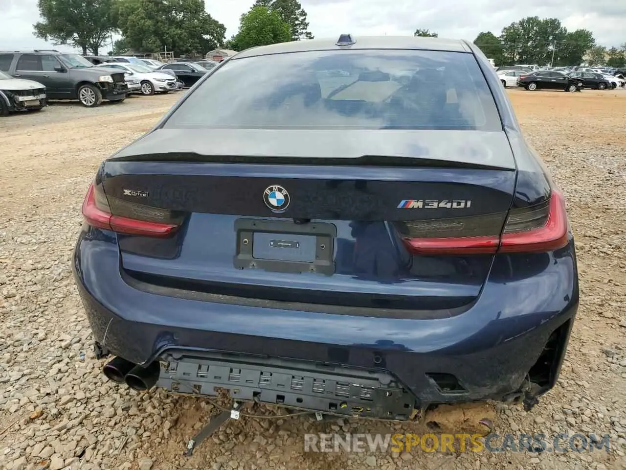 6 Photograph of a damaged car 3MW49FF07P8D67329 BMW M3 2023