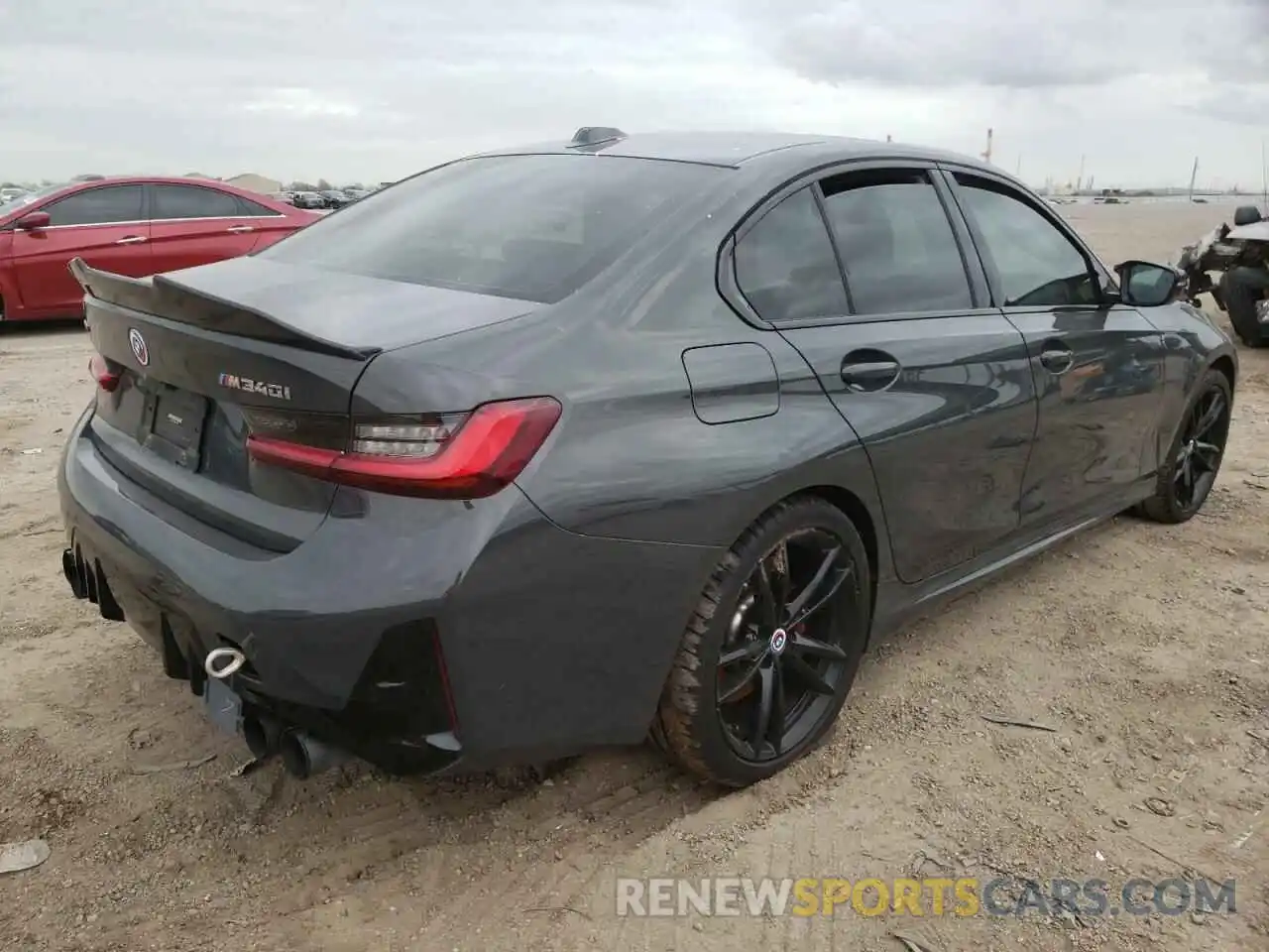 3 Photograph of a damaged car 3MW49FF08P8C82970 BMW M3 2023