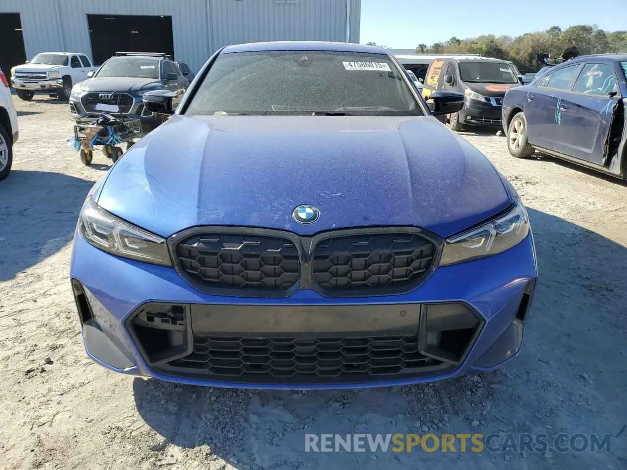 5 Photograph of a damaged car 3MW49FS04P8D34326 BMW M3 2023