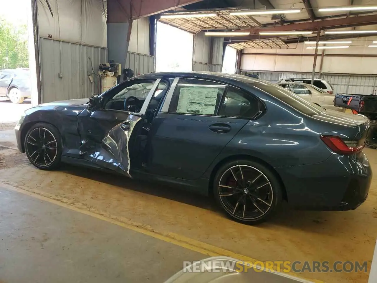 2 Photograph of a damaged car 3MW59FT0XS8F18312 BMW M3 2025