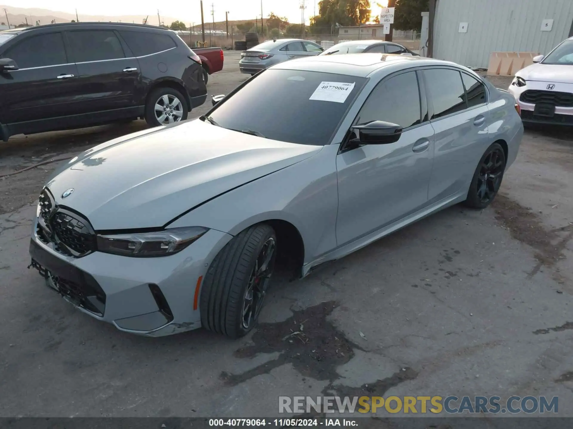 2 Photograph of a damaged car 3MW59FT05S8E98325 BMW M340I 2025