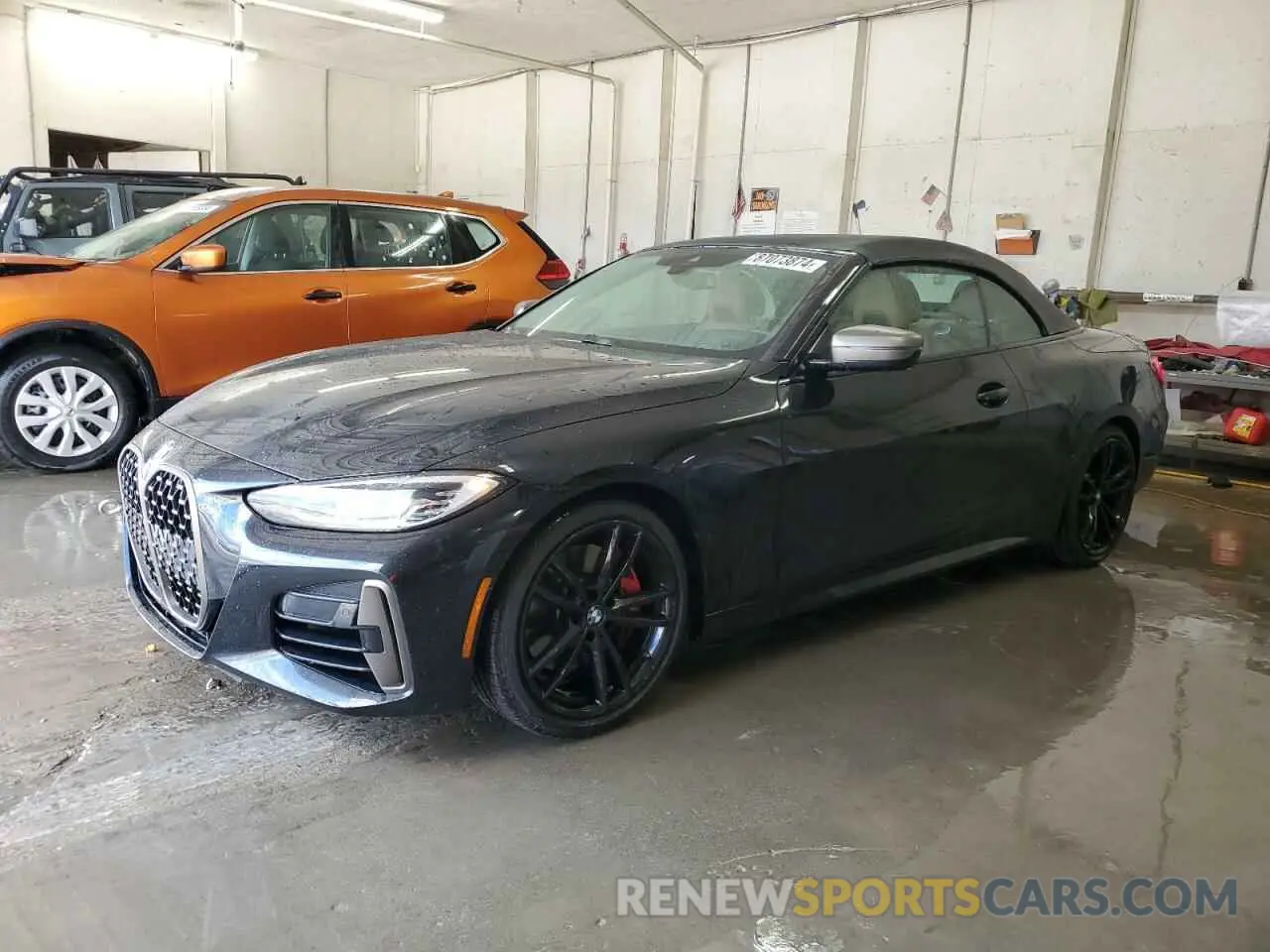 1 Photograph of a damaged car WBA53AT03MCG20974 BMW M4 2021
