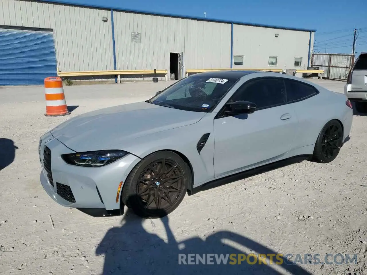 1 Photograph of a damaged car WBS53AZ07MCH50971 BMW M4 2021