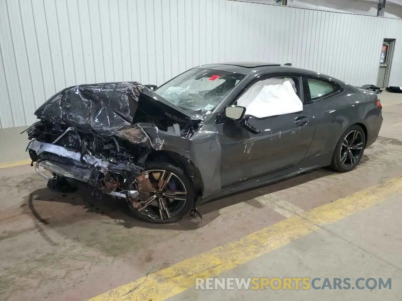 1 Photograph of a damaged car WBA13AR08NCJ41843 BMW M4 2022