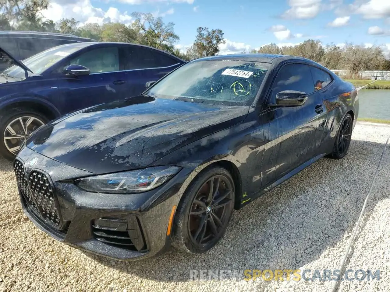 1 Photograph of a damaged car WBA83AP05NCJ52588 BMW M4 2022