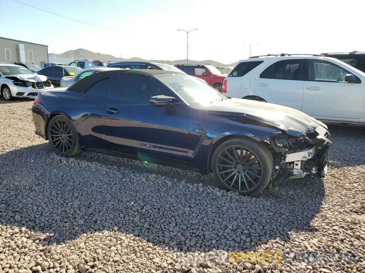 4 Photograph of a damaged car WBS33BA05NCK13099 BMW M4 2022