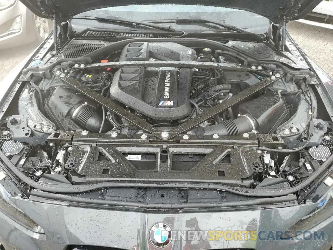 11 Photograph of a damaged car WBS43AZ03NCK18031 BMW M4 2022