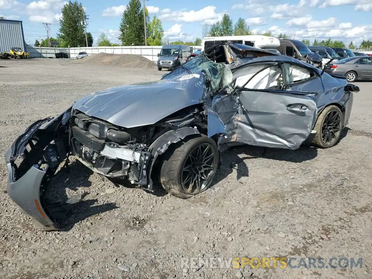 1 Photograph of a damaged car WBS43AZ05NCK39222 BMW M4 2022