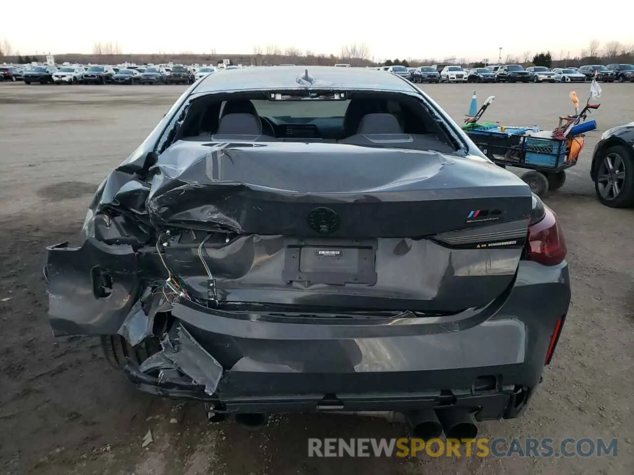 6 Photograph of a damaged car WBS43AZ0XNCH64490 BMW M4 2022
