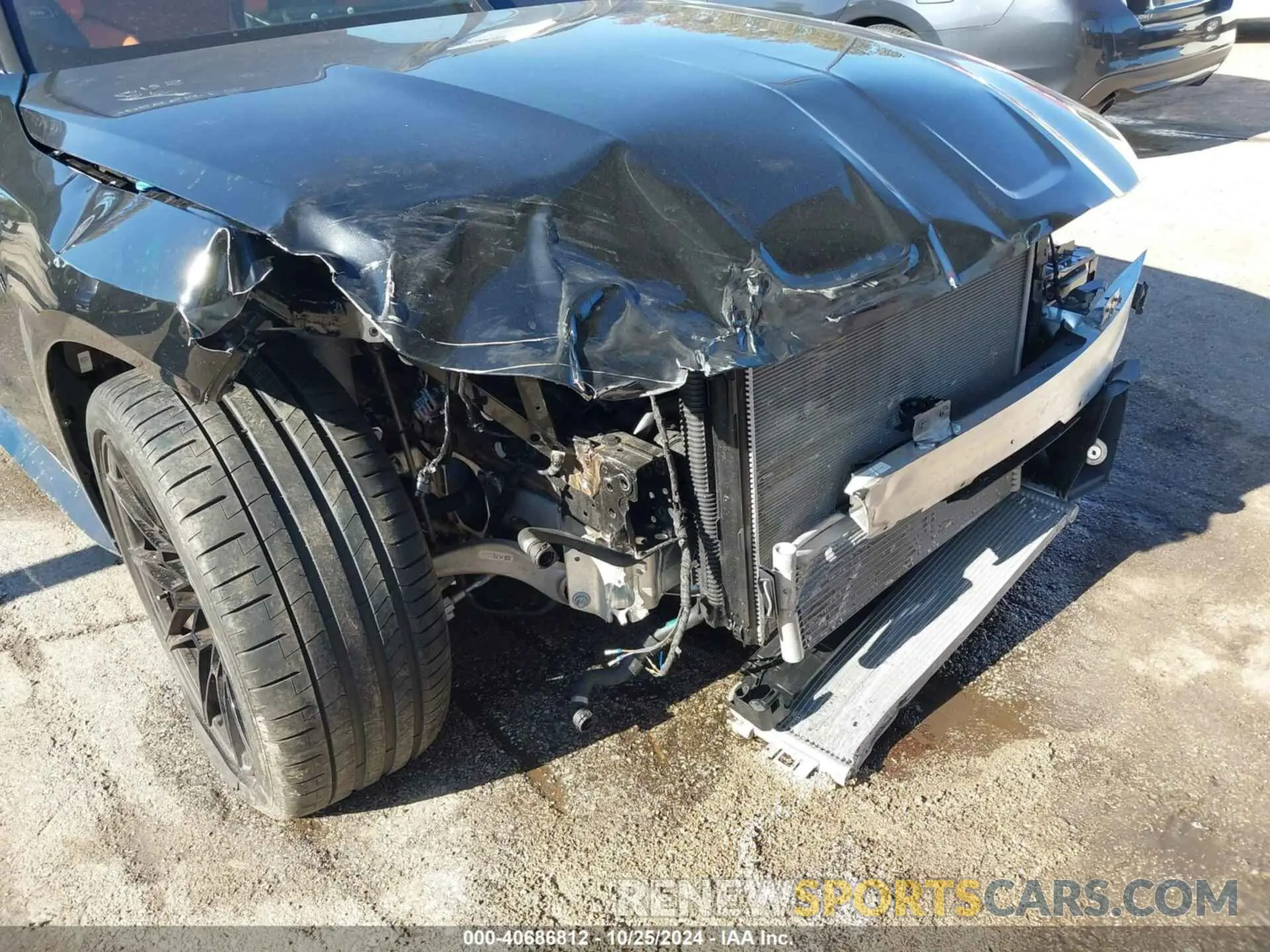 6 Photograph of a damaged car WBS33BA04RCP83049 BMW M4 2024
