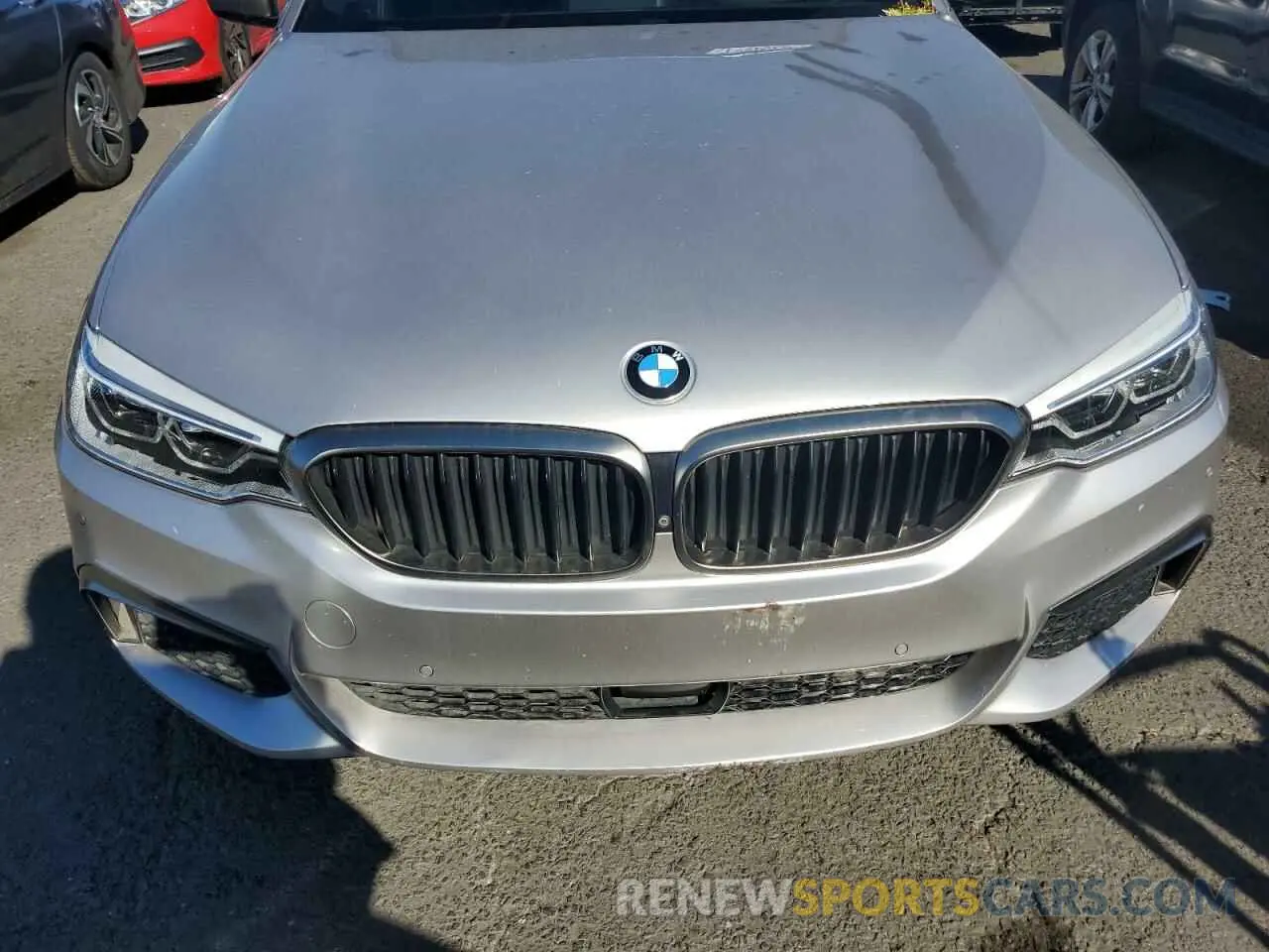 11 Photograph of a damaged car WBAJB9C59KB288647 BMW M5 2019
