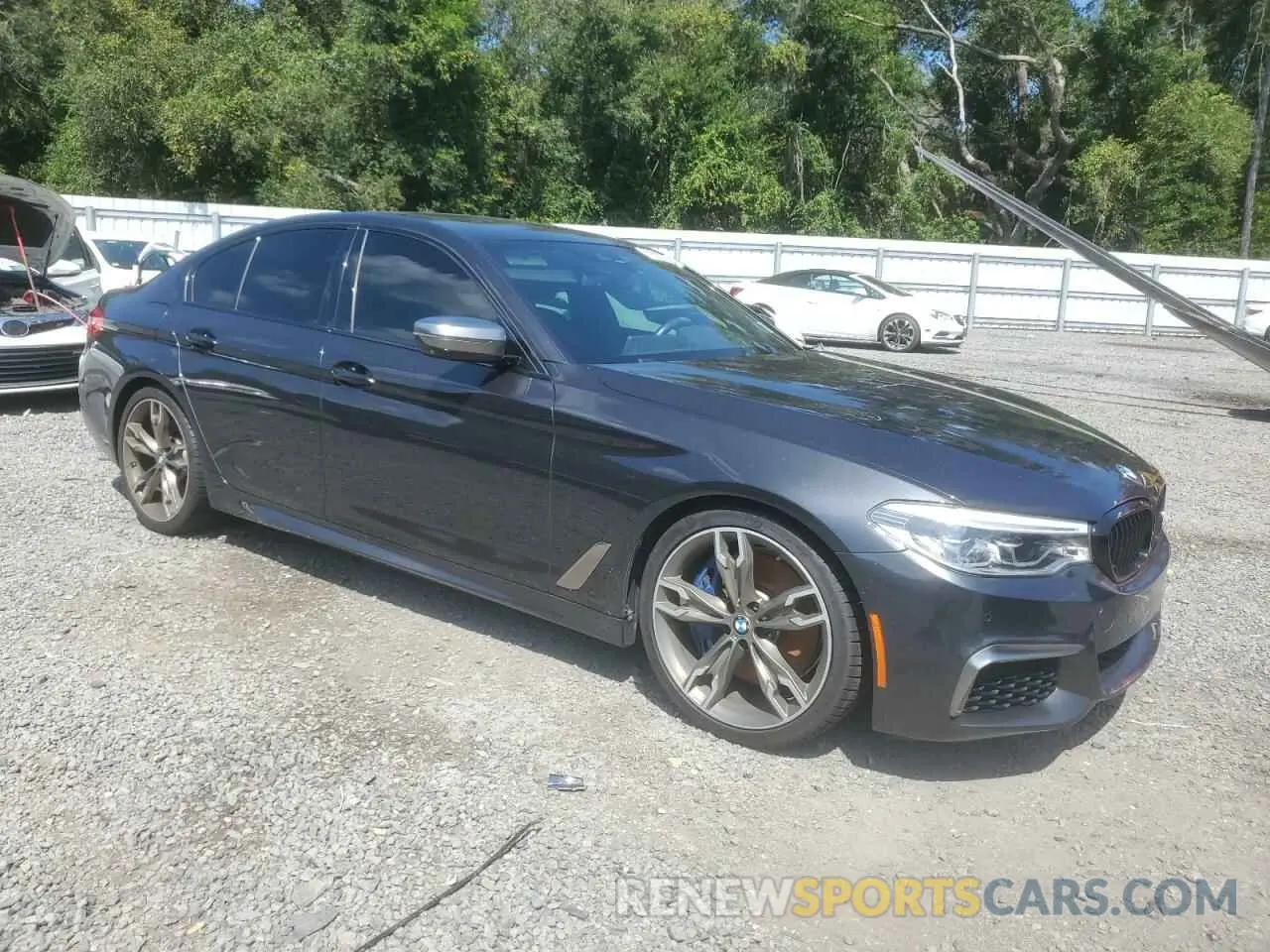 4 Photograph of a damaged car WBAJS7C02LCD36366 BMW M5 2020
