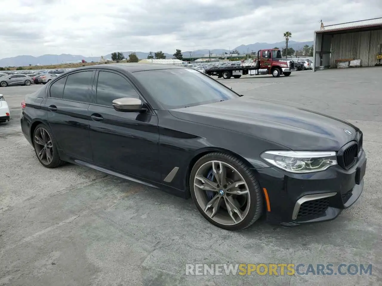 4 Photograph of a damaged car WBAJS7C03LBN96570 BMW M5 2020