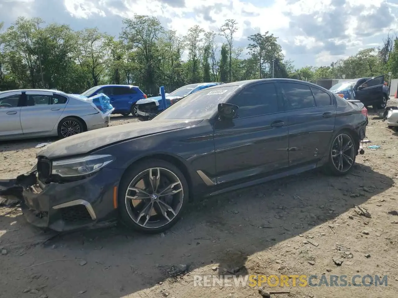 1 Photograph of a damaged car WBAJS7C03LCD00279 BMW M5 2020