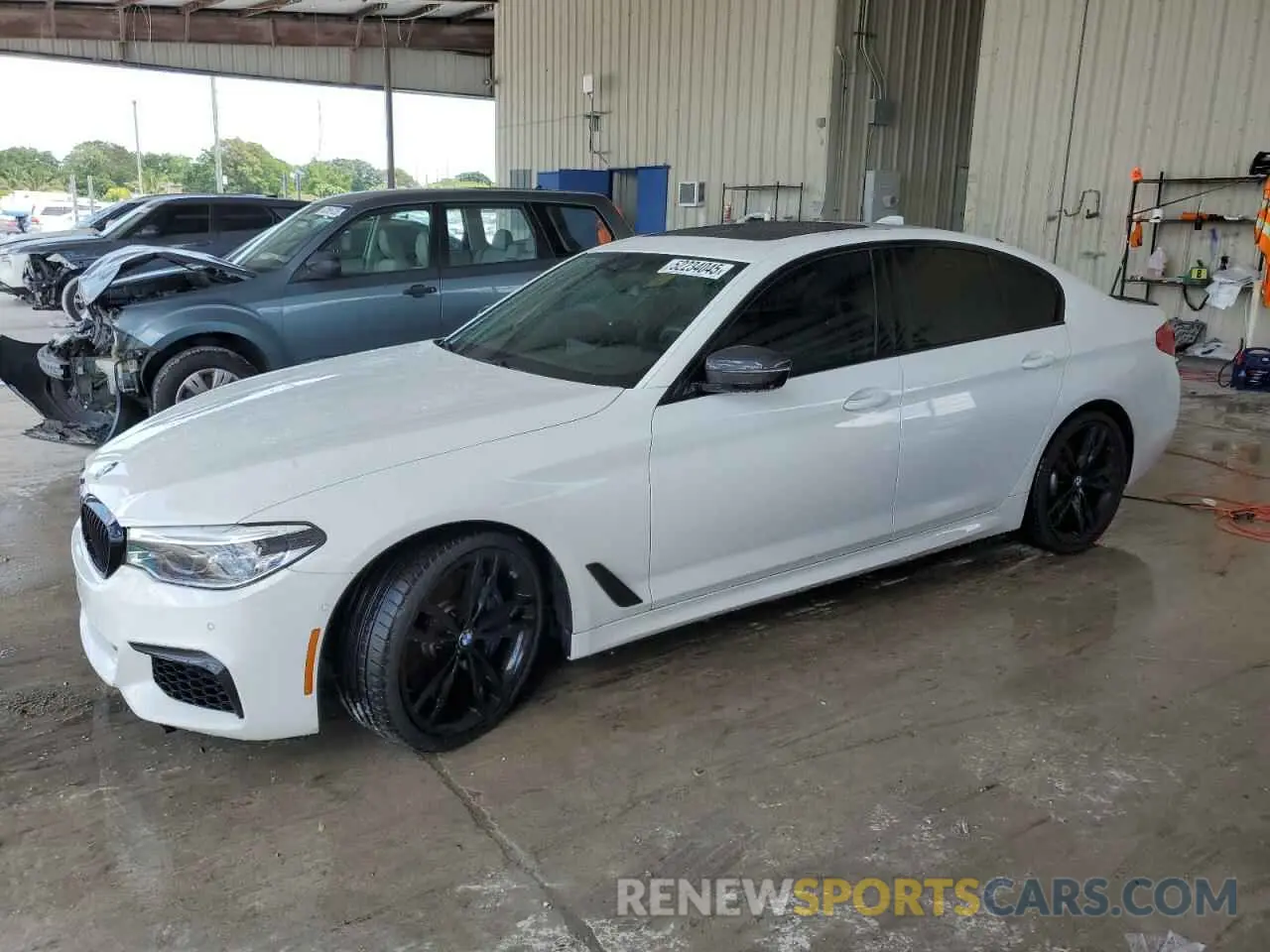 1 Photograph of a damaged car WBAJS7C07LBN96328 BMW M5 2020