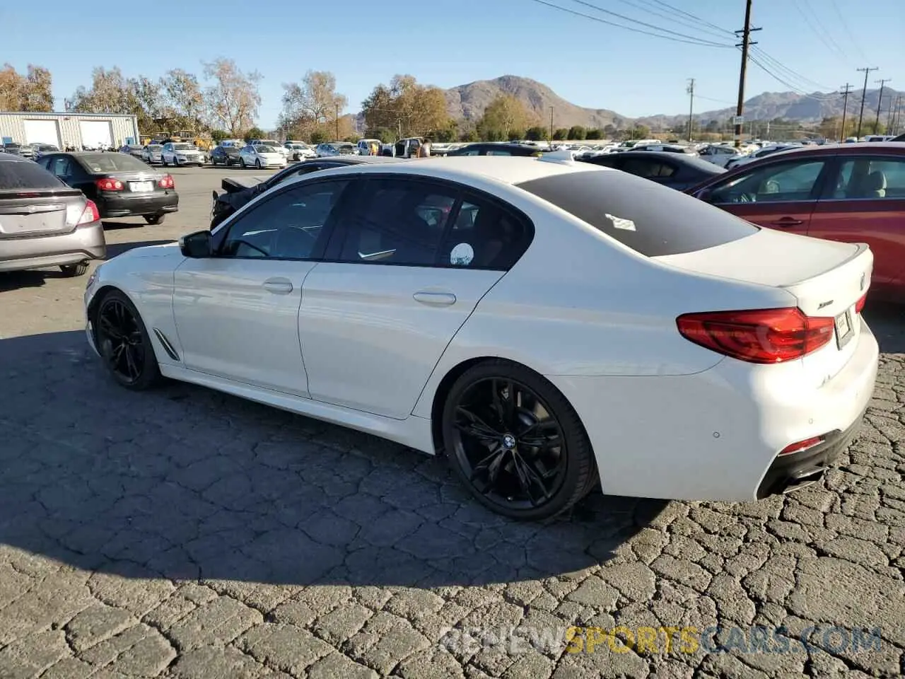 2 Photograph of a damaged car WBAJS7C07LCD89273 BMW M5 2020