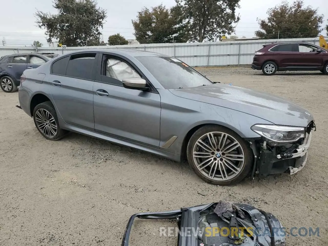 4 Photograph of a damaged car WBAJS7C0XLCD51486 BMW M5 2020
