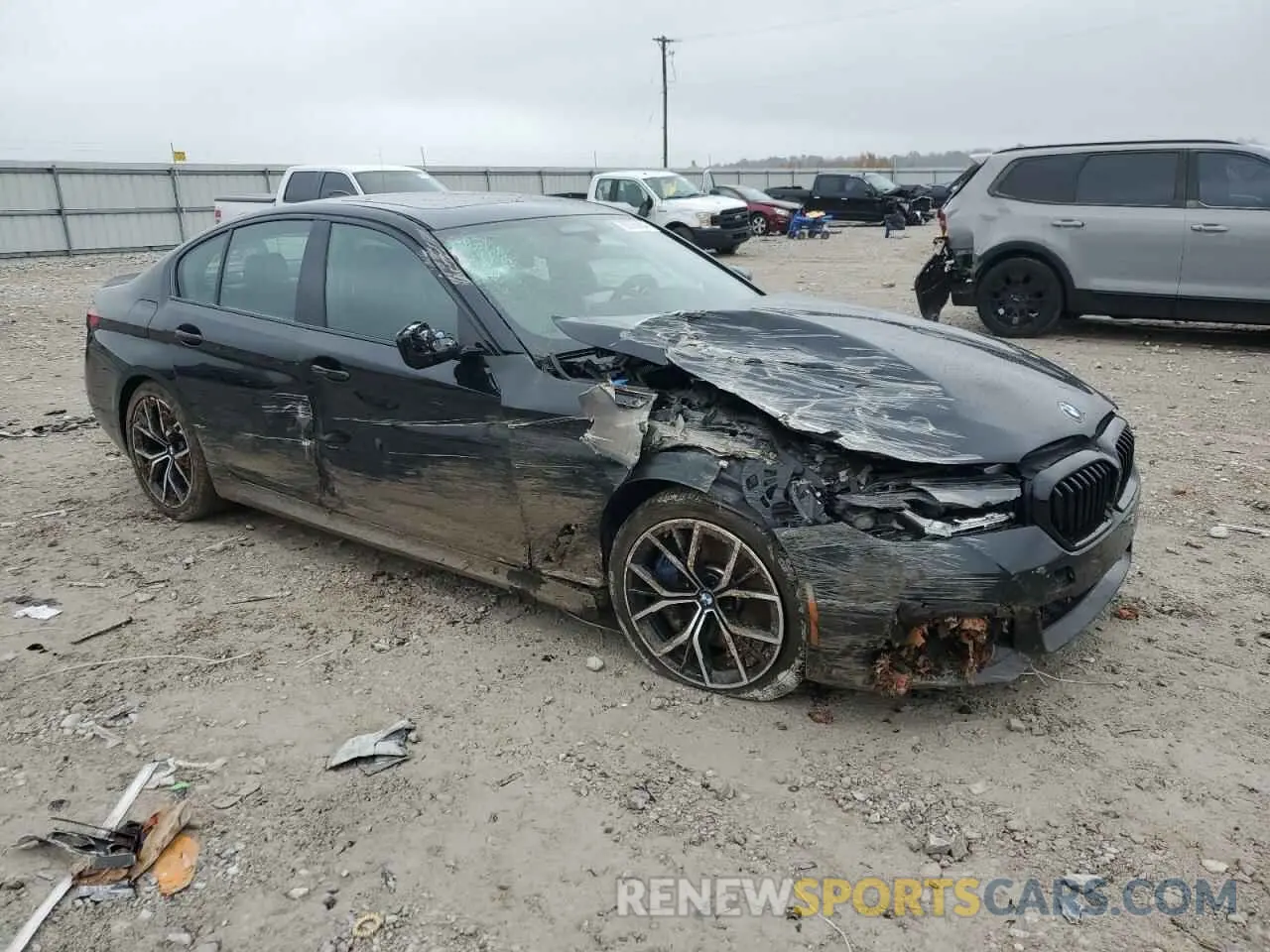 4 Photograph of a damaged car WBA13BK00MCG04608 BMW M5 2021