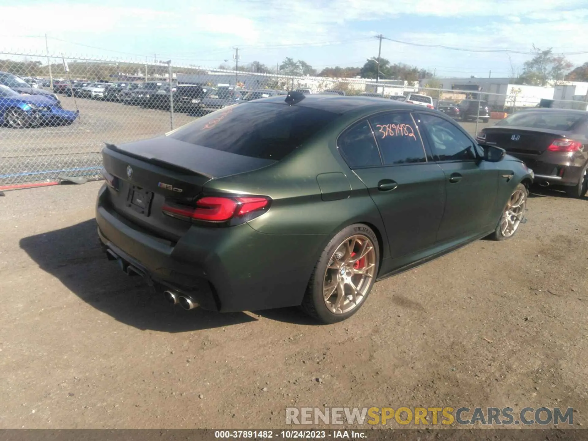 4 Photograph of a damaged car WBS73CH00NCJ75875 BMW M5 2022