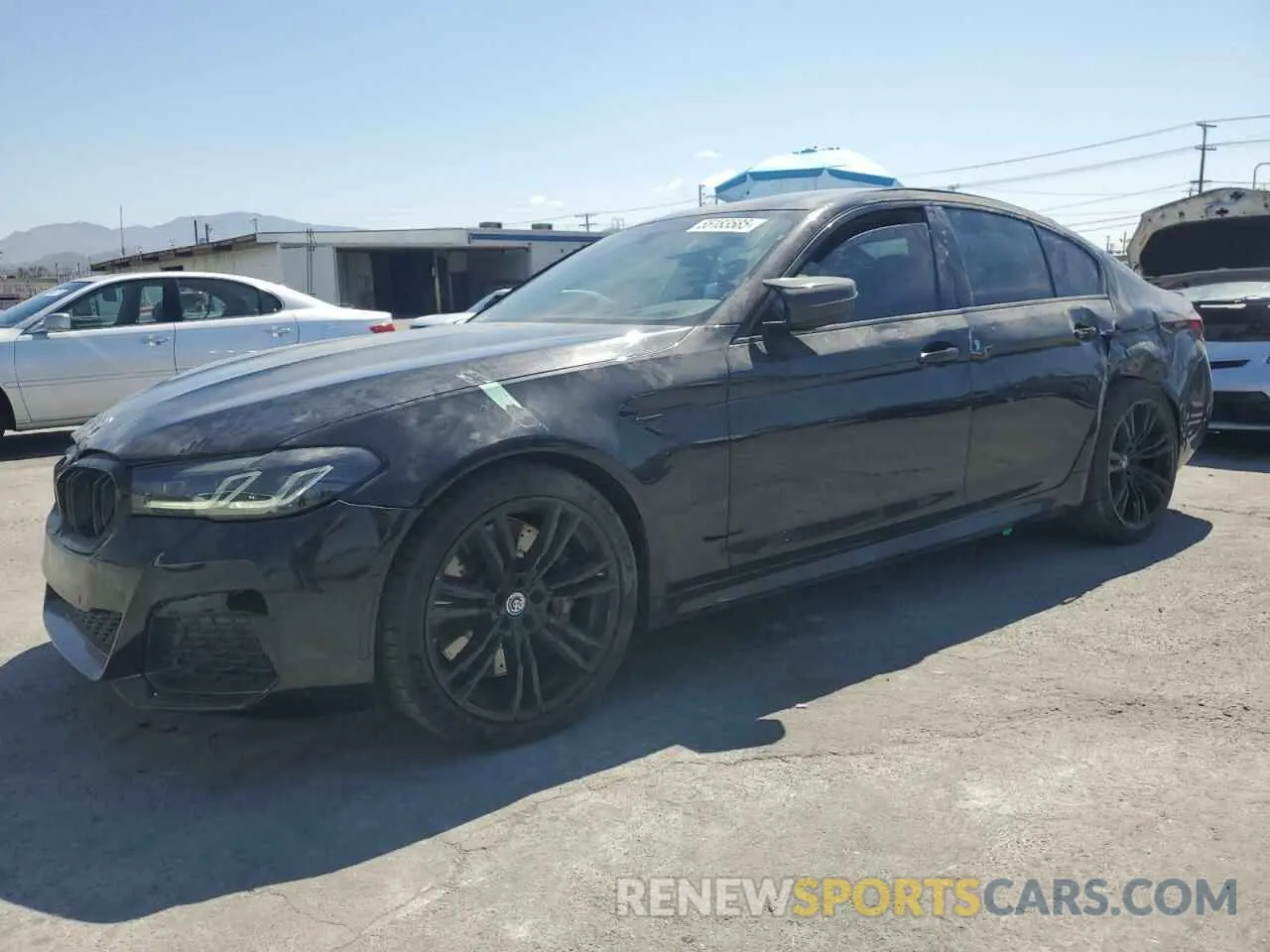 1 Photograph of a damaged car WBS83CH05NCK23035 BMW M5 2022